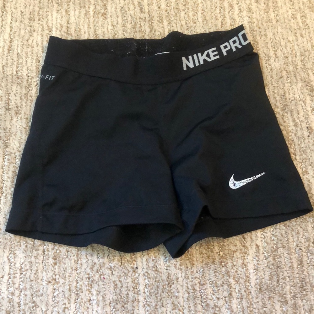 (another pair) of black Nike pro shorts